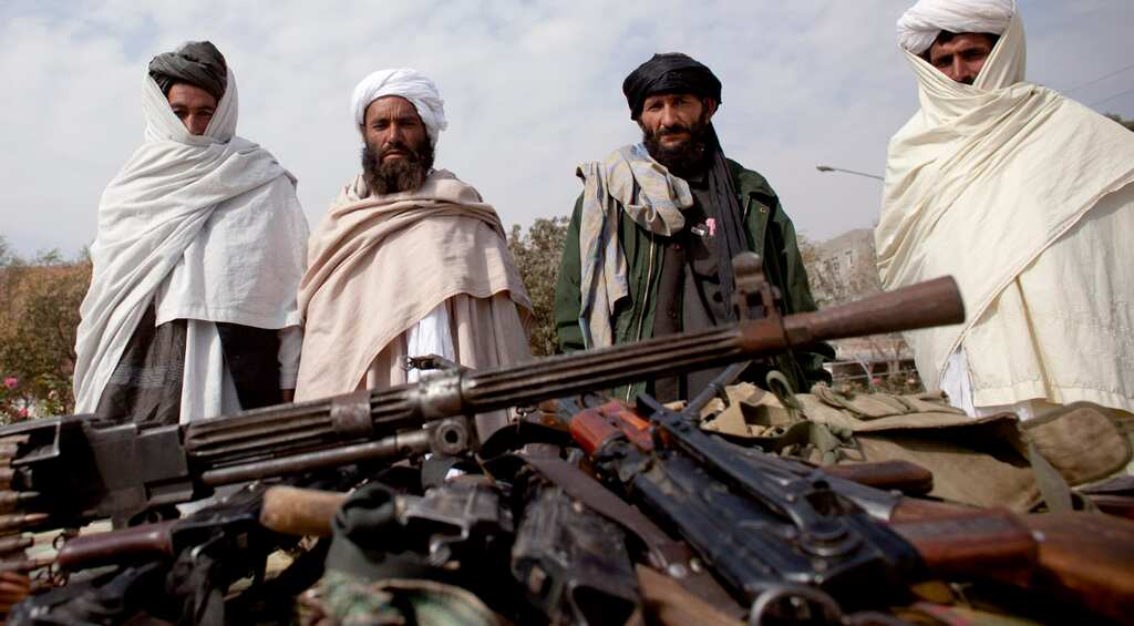 Taliban suicide bombers kill 27, wound 40 in attack on Afghan police