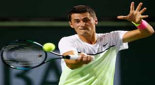 Tomic told to apologise for 'retard' comment