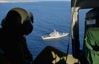 At least 10 dead on sinking migrant boat: Italian coastguard