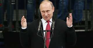 Putin signs controversial anti-terror measures into law