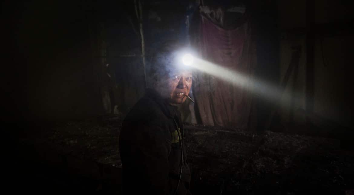 12 workers trapped in flooded coal mine in China