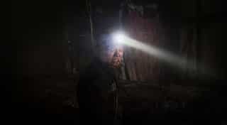 12 workers trapped in flooded coal mine in China