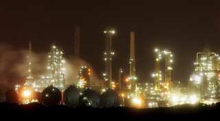 Oil steady as market moves towards balance, but slow Asian demand hurts