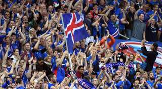 Euro 2016: Iceland returns home to cheering crowds and Viking war chants