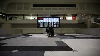 Asian shares slide as investors ponder stimulus outlook