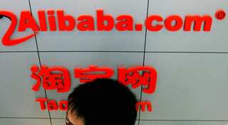 China's Alibaba puts internet in cars, plans to take drivers out