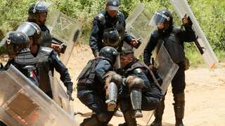 Mexico air lifts food into villages as teacher blockades spread