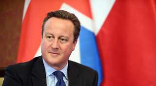 Ex-British PM David Cameron's bodyguard forgets loaded gun in plane toilet