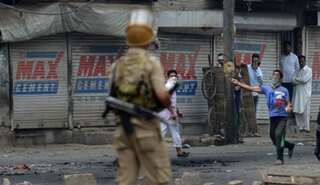 Police driver dies after mob pushes his mobile bunker into Jhelum river
