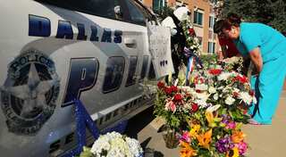 Police and African-American community unite in Dallas after shooting