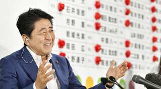Abe wins upper house poll but says changing pacifist constitution not easy
