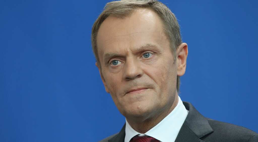 EU head cautions China to respect international system