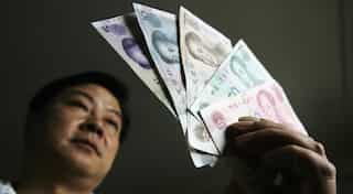 China warns online finance executives with glimpse of prison