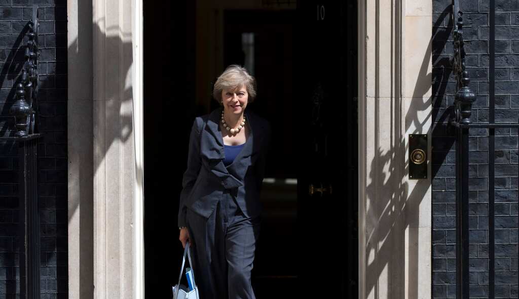 May's neighbours sing her praises