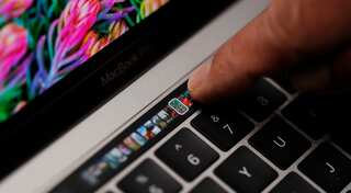 Apple unveils new MacBook Pro with Touch Bar, hikes price
