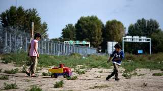 Trapped in Serbia, migrants seek refuge in derelict warehouse