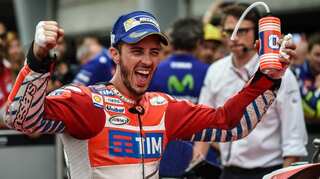 Malaysia MotoGP: Dovizioso wins pole, beats Valentino Rossi