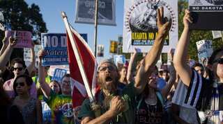 North Dakota pipeline: Facebook users 'check in' to support protests