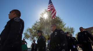 Two US police killed in 'ambush-style' shootings, suspect arrested