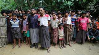 Myanmar arms non-Muslims in Rakhine, Suu Kyi says state responding 'under rule of law'