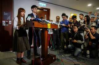 China wades into Hong Kong rebel lawmaker oath battle