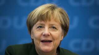 Germany's Merkel tells party ready to run for fourth term