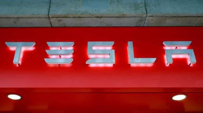 Tesla shares fall over reports of battery plant suspension Tesla shares fall over reports of battery plant suspension