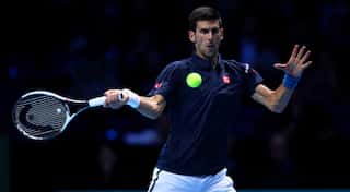 Djokovic just slides past Raonic at ATP World Tour Finals