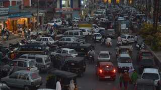 Kashmir: Businesses reopen, post-paid mobile services back up