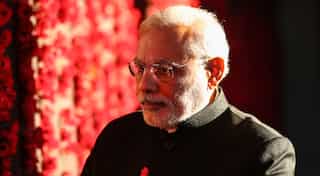 India: Emotional PM tells party MPs to explain demonetisation to people, Opposition insists on explanation in Parliament