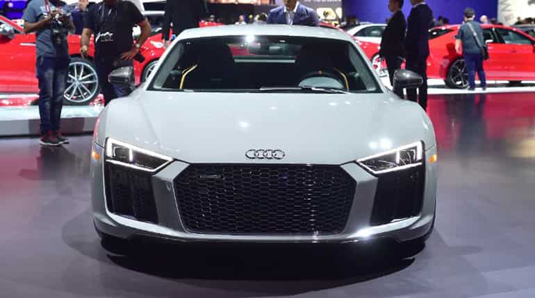 The Audi R8 v10 plus in grey is displayed at the motor show.