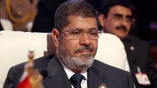 Egypt court quashes former president Morsi's life sentence, orders retrial