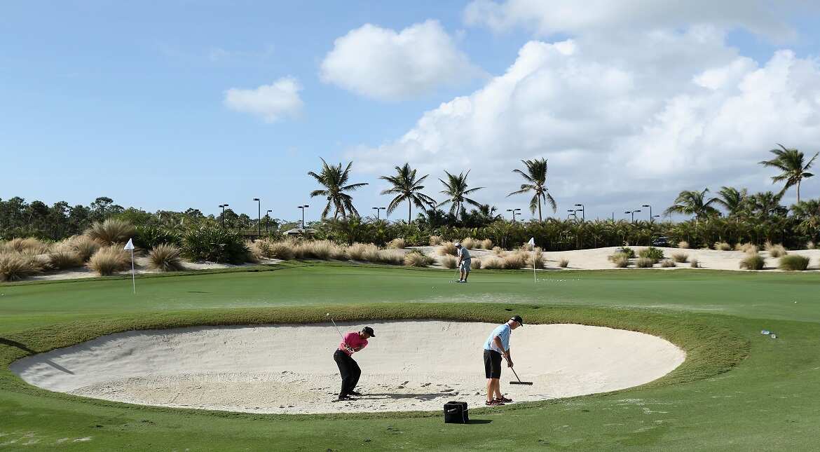 Tiger Woods, world champion in golf practices from a bunker ahead of the Hero World Challenge at Albany, The Bahamas  in Nassau, Bahamas