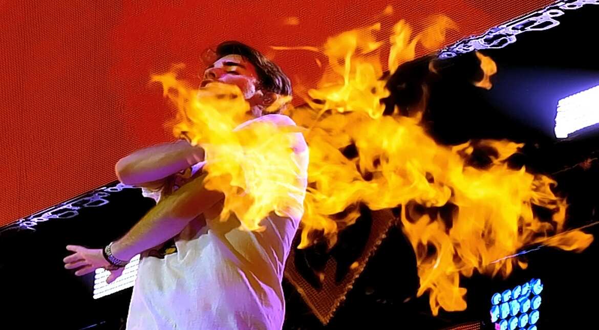Pyrotechnics are deployed while recording artist Andrew Taggart of music group The Chainsmokers performs onstage