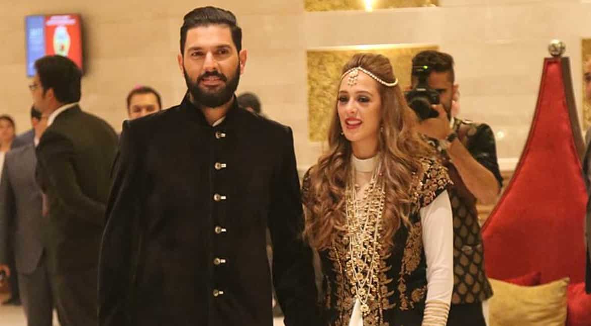 Indian cricketer Yuvraj Singh and his bride-to-be, actress Hazel Keech, were a picture of happiness as they welcomed guests.