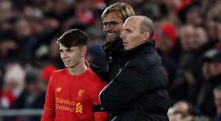 Record-breaker Woodburn helps Liverpool reach League Cup semis