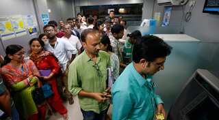 Demonetisation: Banks see big rush on pay day, many ATMs still dry