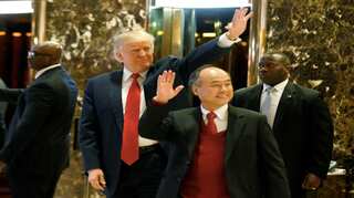 Trump trumpets $50bn investment deal with Japan's SoftBank ahead of victory rally
