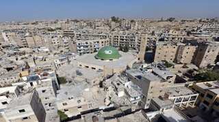 Rebels seek ceasefire with Syrian army closer to retaking Aleppo