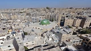 Rebels seek ceasefire with Syrian army closer to retaking Aleppo