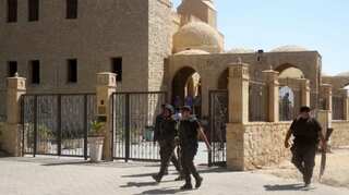 Roadside bombings in Egypt kill 6 policemen, 1 civilian