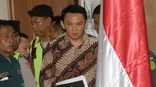 Jakarta's Christian governor stands trial for blasphemy