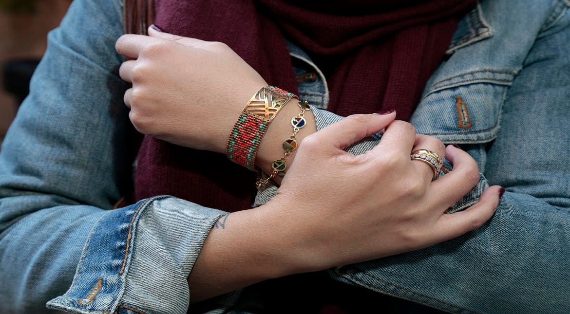 Chinese linguist Valeria Grech is wearing a Guess denim jacket, Stefanel scarf, Codigo Basico dress