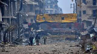 Syria: Fighting in east Aleppo over as rebels reach deal with government to evacuate city