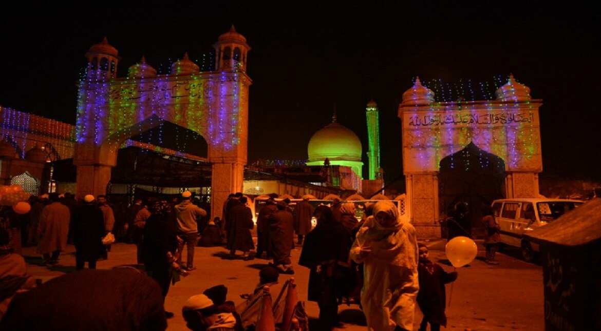 Kashmiri Muslims converge on the Hazratbal, a single domed facade white marble shrine which houses