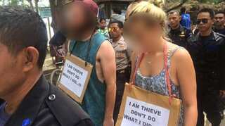 Tourists Paraded In 'Walk Of Shame' Over Bicycle Theft In Indonesia