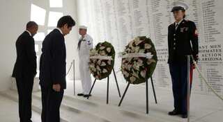 At Pearl Harbour, Abe pledges Japan will never wage war again