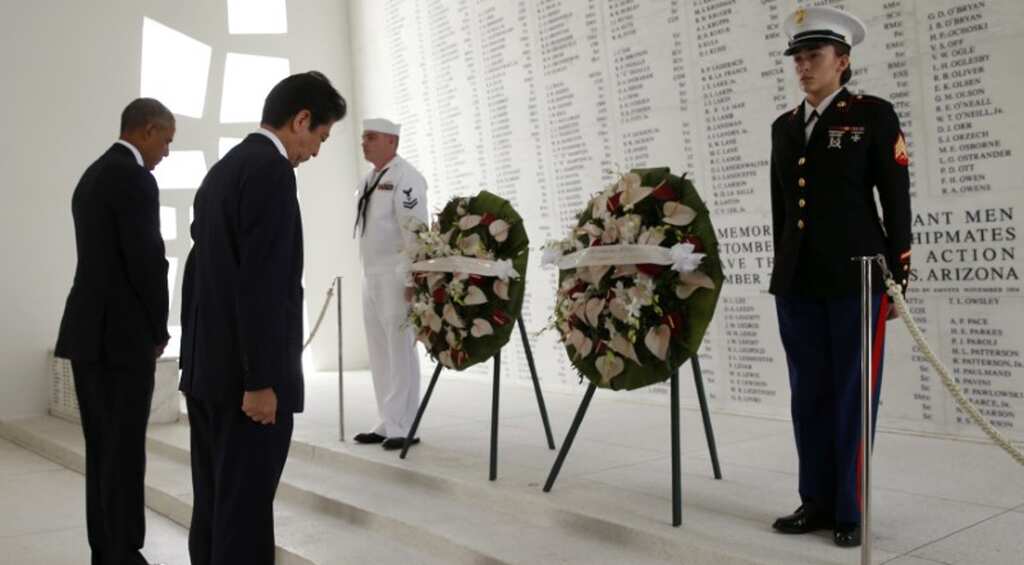 At Pearl Harbour, Abe pledges Japan will never wage war again