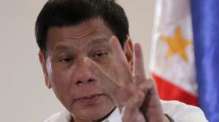 Philippine President Duterte sweeps China's militarisation, man-made island issue under rug