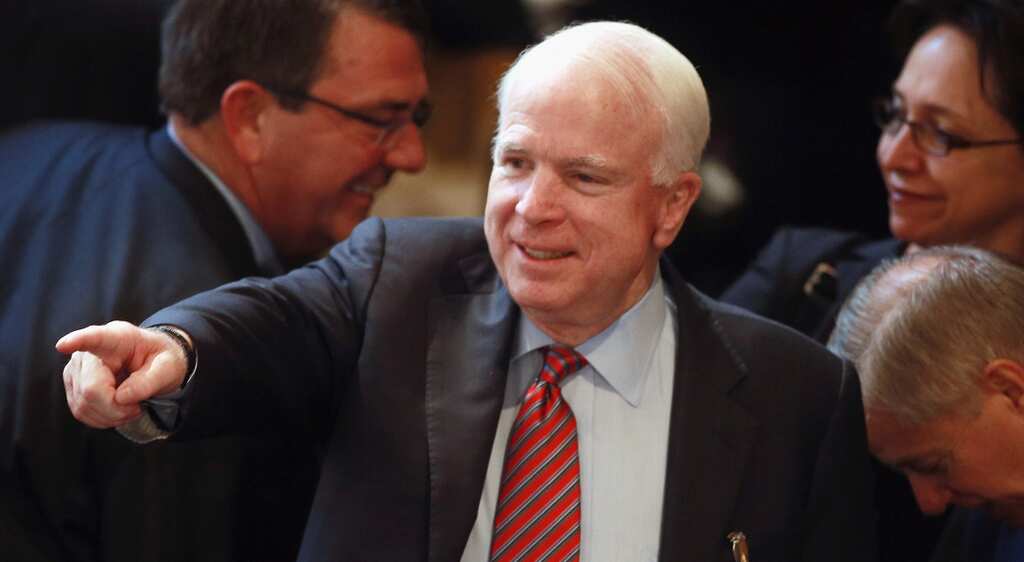 Senator McCain meets Ukraine president, says Russia must 'pay the price' for cyber attacks